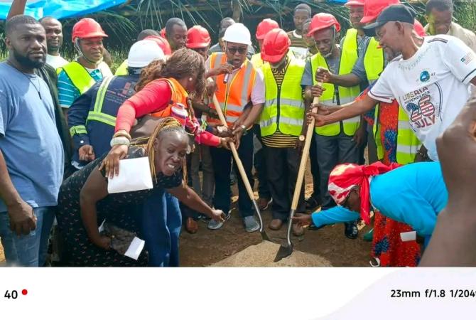 Hon. Sirleaf Ralph Tyler, Minister of Transport breaks ground in Bomi County.
