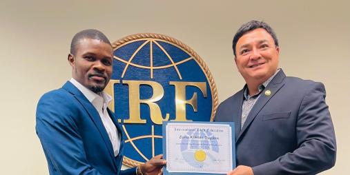 Assistant Minister receiving his certificate 